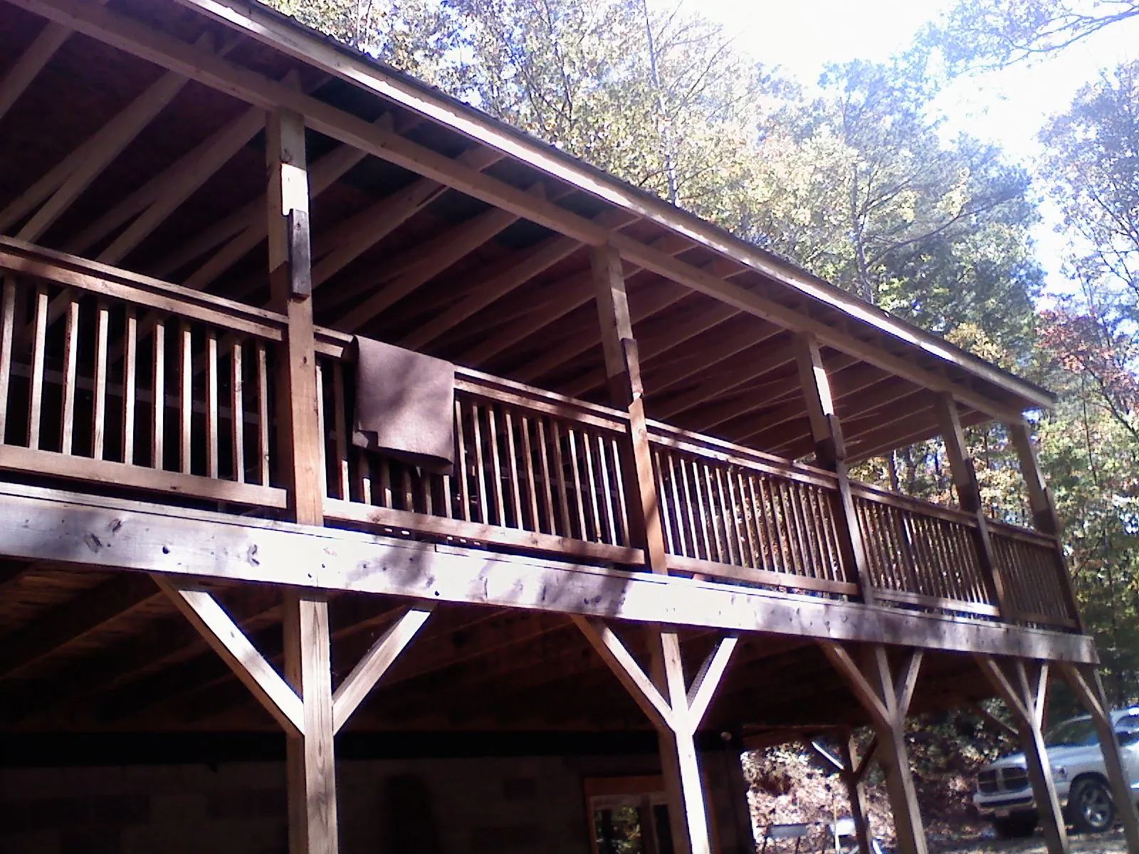 Timber framing under a new elevated porch and deck — Roof Leak Repair in Whitesboro by Roofing Brothers